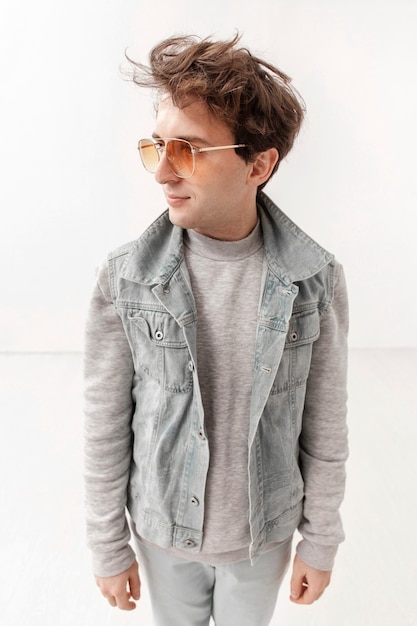 Free photo high angle teenage boy with sunglasses