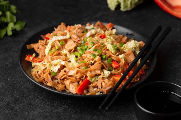 High angle of traditional asian meal with chopsticks