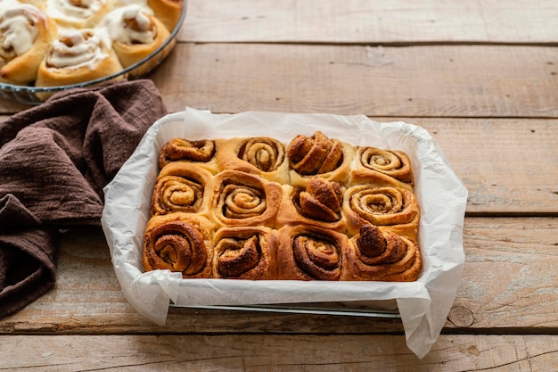 Free photo high angle tray with cinnamon rolls