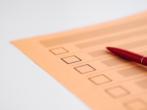 Free photo high angle uncompleted voting questionnaire close-up