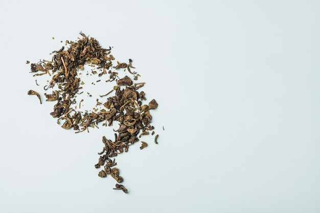 High angle view of dry flower petals on white backdrop