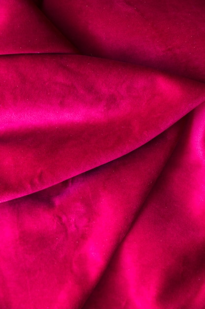 Free photo high angle view of folded pink luxurious cloth