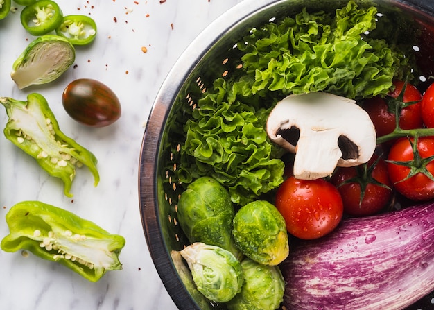 Free Photo high angle view of an organic healthy vegetables in colander