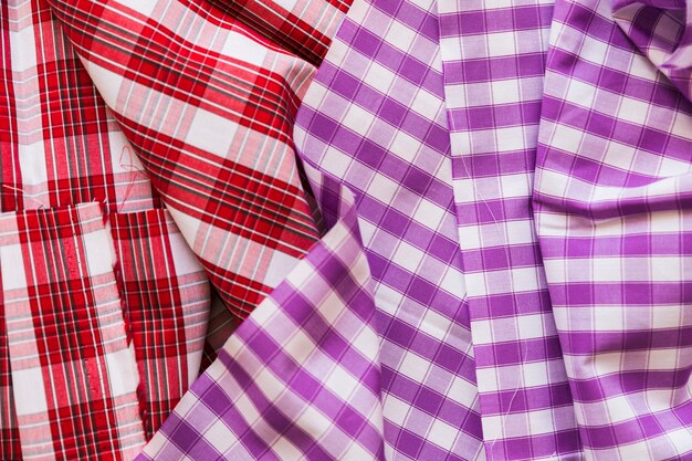 High angle view of purple and red cotton garment background