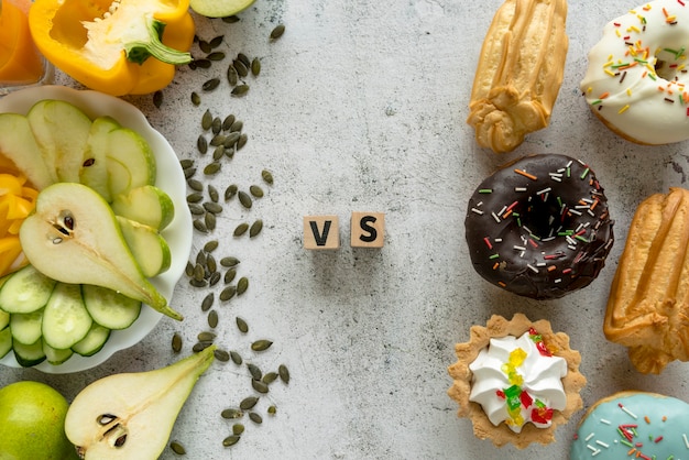 Free photo high angle view of tasty food showing healthy versus unhealthy concept