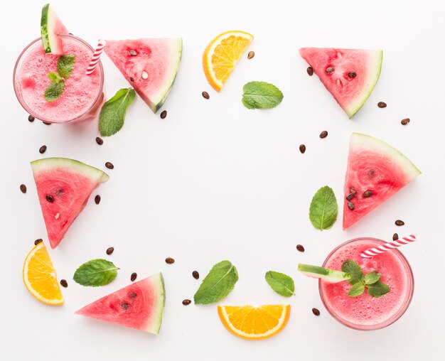 High angle of watermelon cocktail glasses with mint