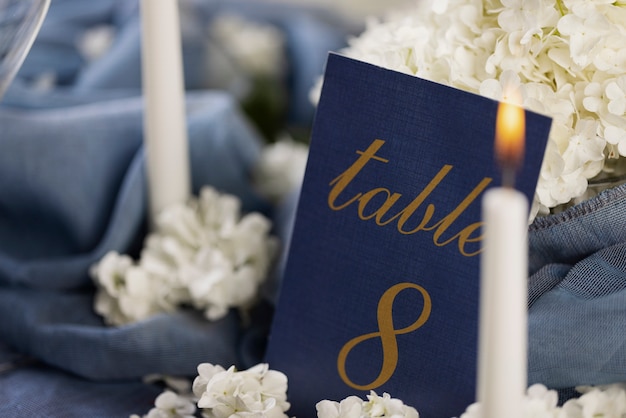 Free photo high angle wedding table arrangement with candle