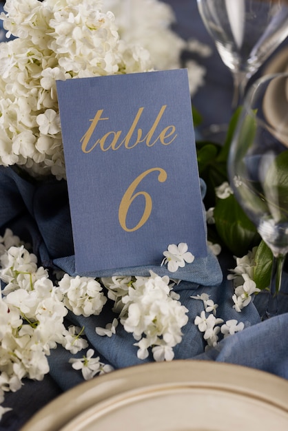 Free photo high angle wedding table arrangement with flowers