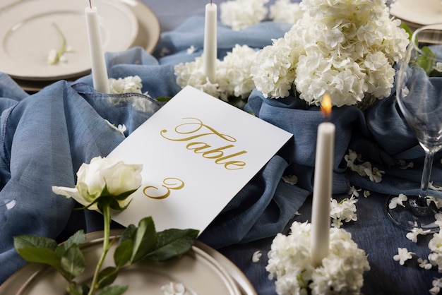 Free photo high angle wedding table assortment with candles