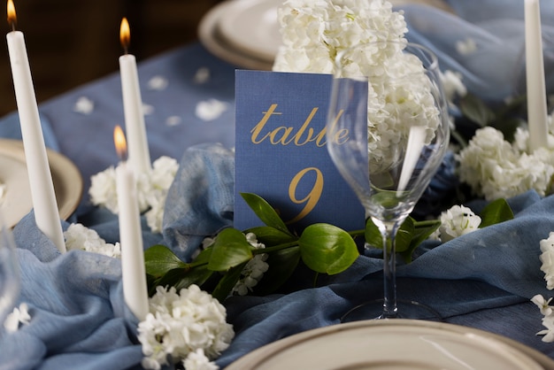 High angle wedding table number with plates