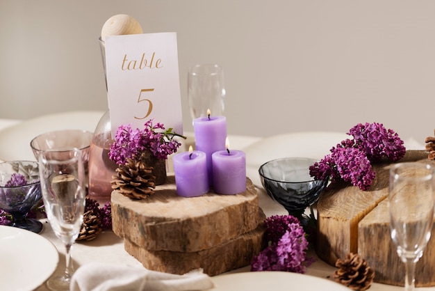 Free photo high angle wedding table with candles and flowers