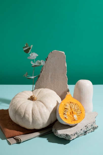 High angle white pumpkins with green  background