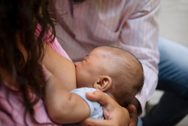 High angle woman breastfeeding