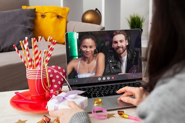 Free Photo high angle woman celebrating with laptop