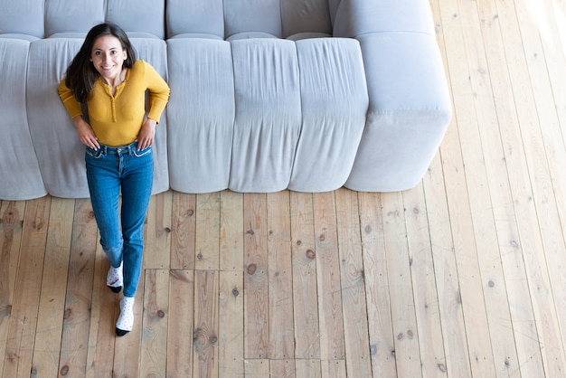 High angle of woman in living room