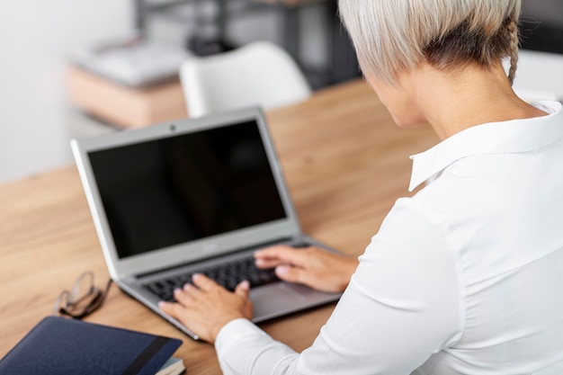 High angle woman at office working