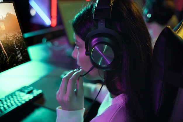 Free Photo high angle woman playing videogame