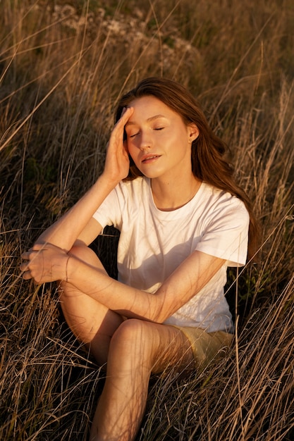 High angle woman posing at sunset