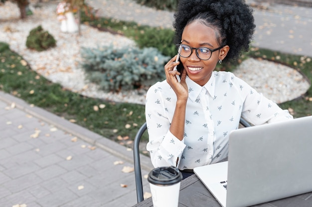 High angle woman talking over phone