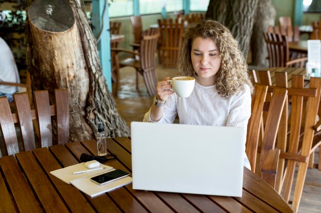 High angle woman at terrace working