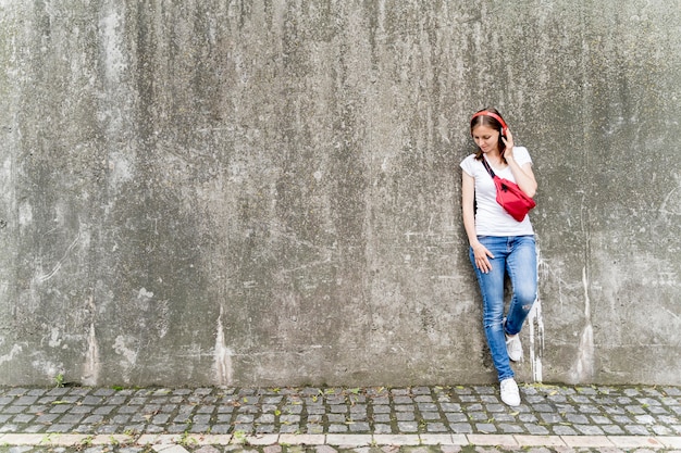 Free Photo high angle woman with headphones