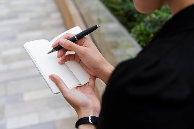 High angle of woman writing in agena