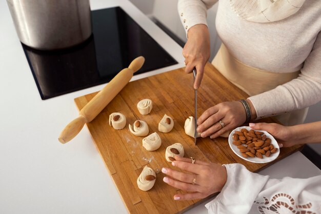 High angle women cooking for ramadan