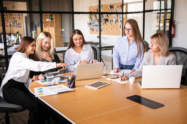 High angle women meeting at work