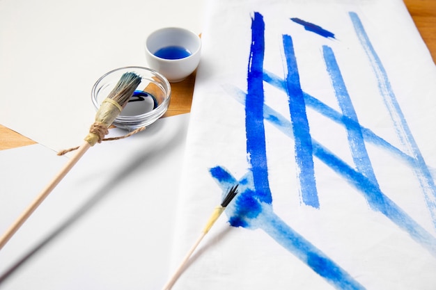 Free Photo high view alternative blue paint brush