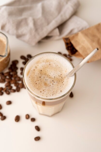 High view of coffee glass and milk