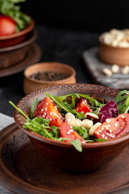 High view delicious salad on brown plate