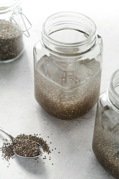 High view jar with water and seeds