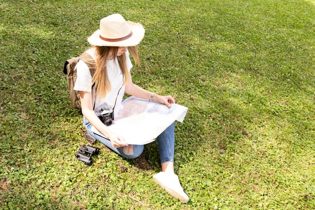 High view of person reading a map