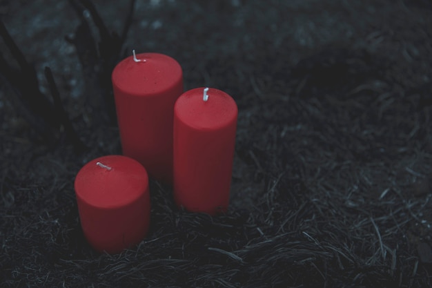 Free photo high view shot of red candles for summoning process