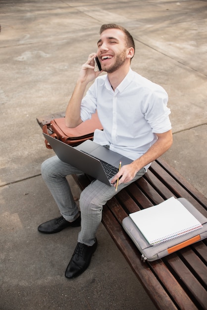 High view shot of university student talking on the phone