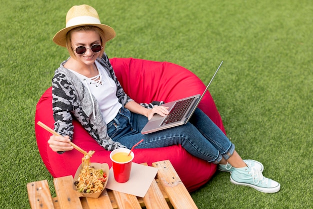 High view shot of woman holding chopsticks