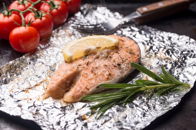 High view slice of fish and tomato