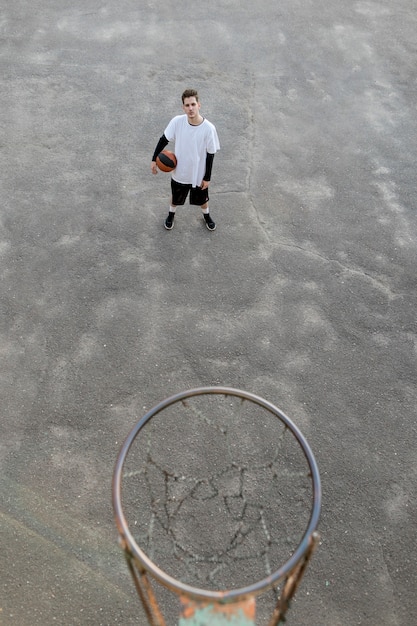 Free photo high view urban basketball player