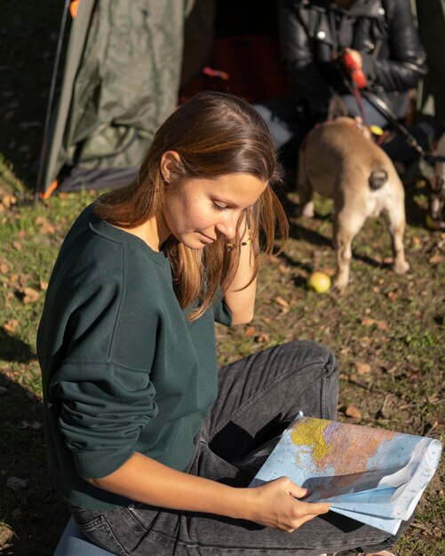 High view woman looking at a map