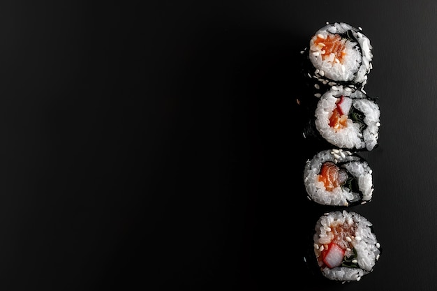 Free Photo highly detailed seafood sushi dish with simple black background