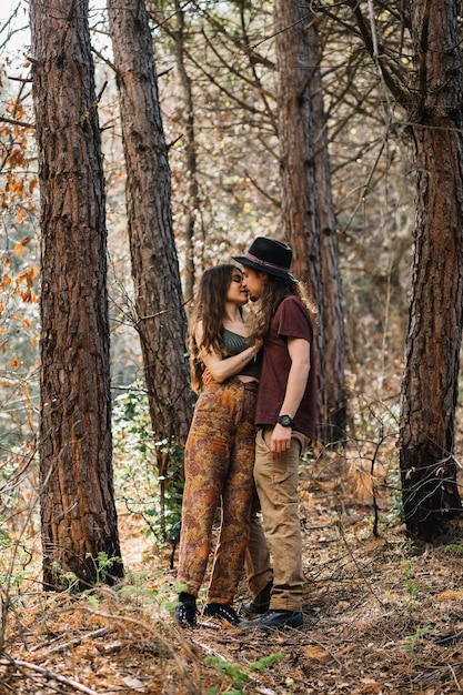 Hiker couple in love kissing in nature