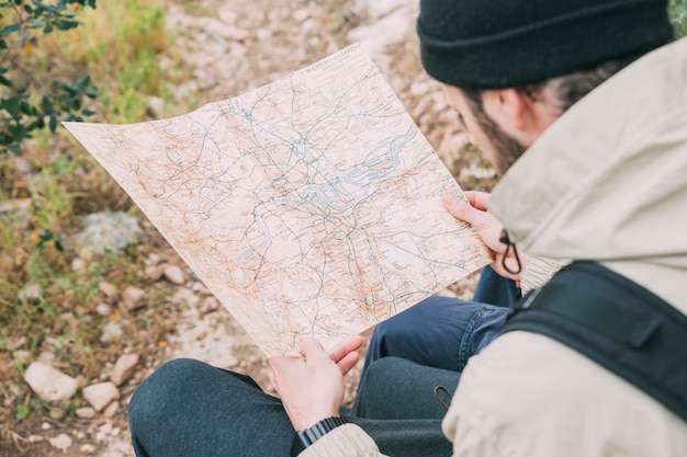 Hiker looking at map