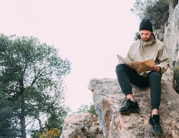 Hiker looking at map