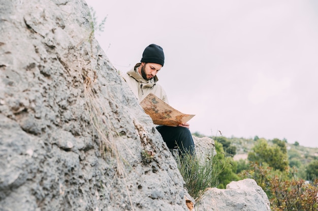 Hiker looking at map