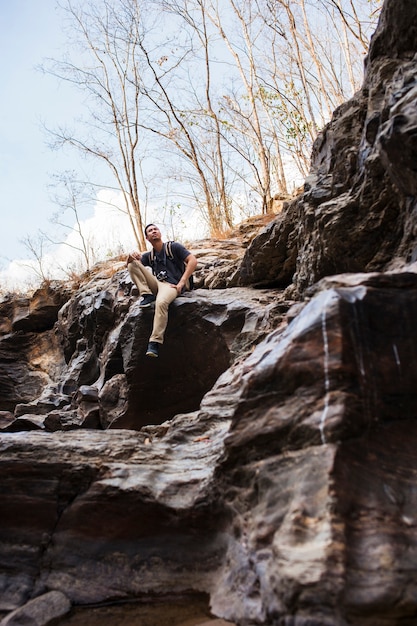 Hiker sitting on rocks