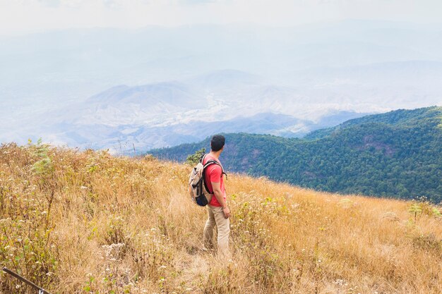 Hiker standing in the mountains