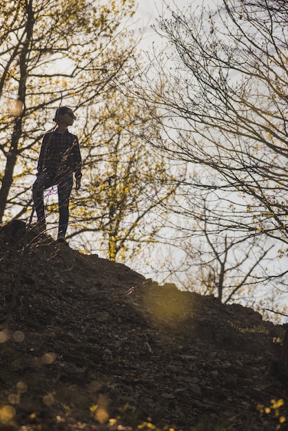 Hiker surrounded by trees