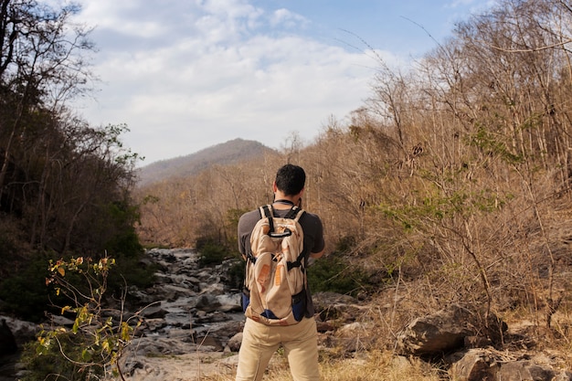 Hiker taking photo of landscape