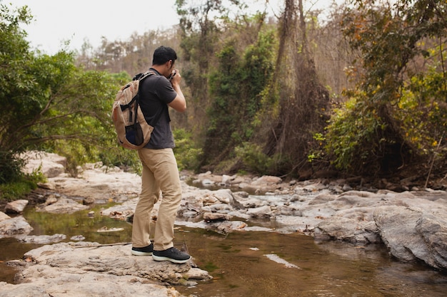 Free photo hiker taking photo