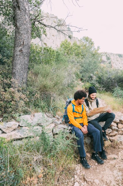 Hikers sitting on rock